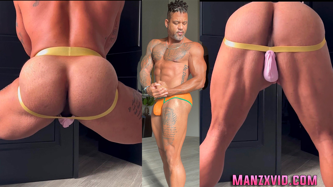 Fitness Video Tape Celeb Shaun T squats in jock and spread cheeks